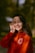 woman in red long sleeve shirt smiling