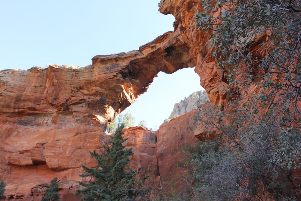 brown rock formation under blue sky during daytime