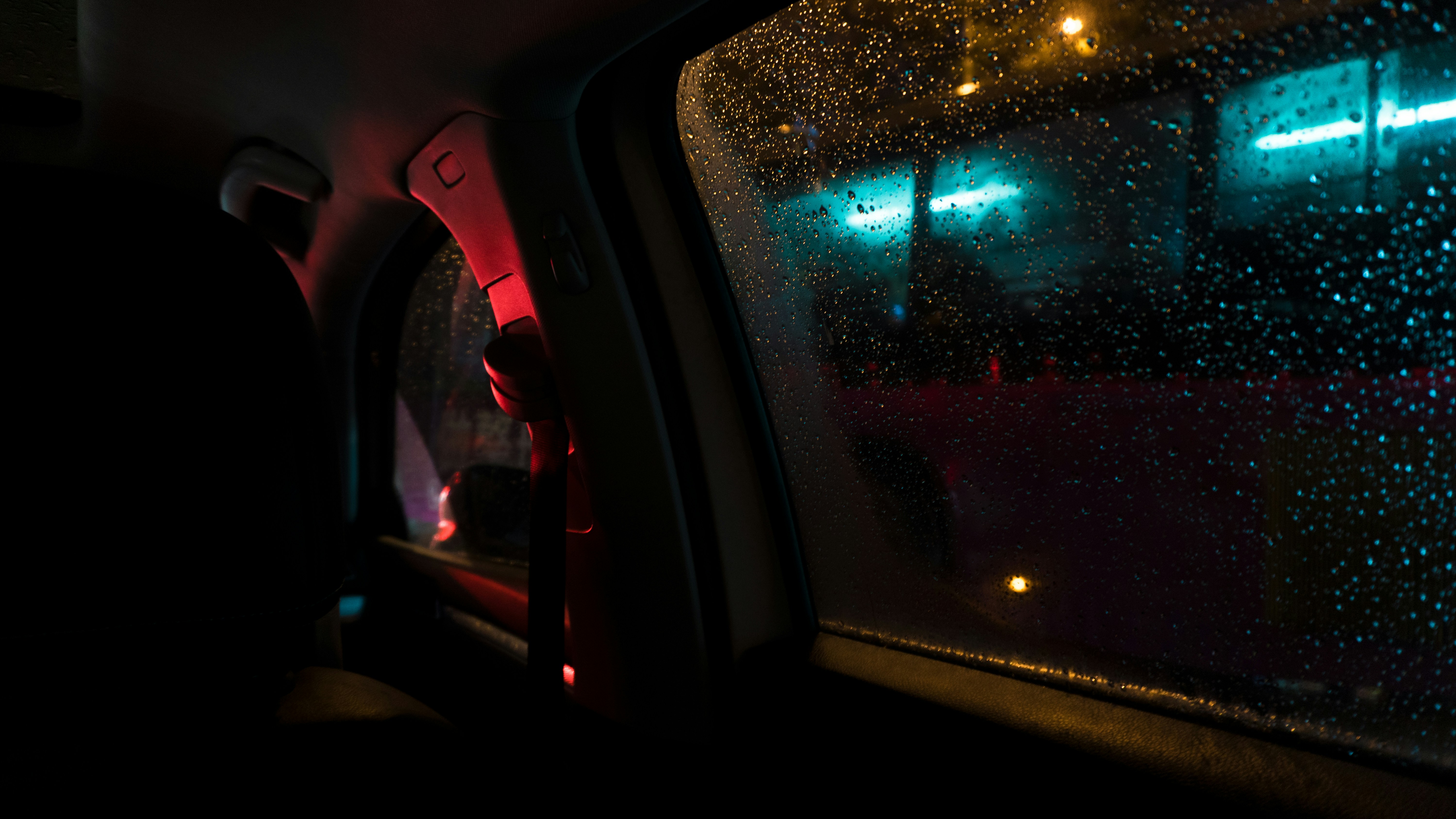 car side mirror with water droplets