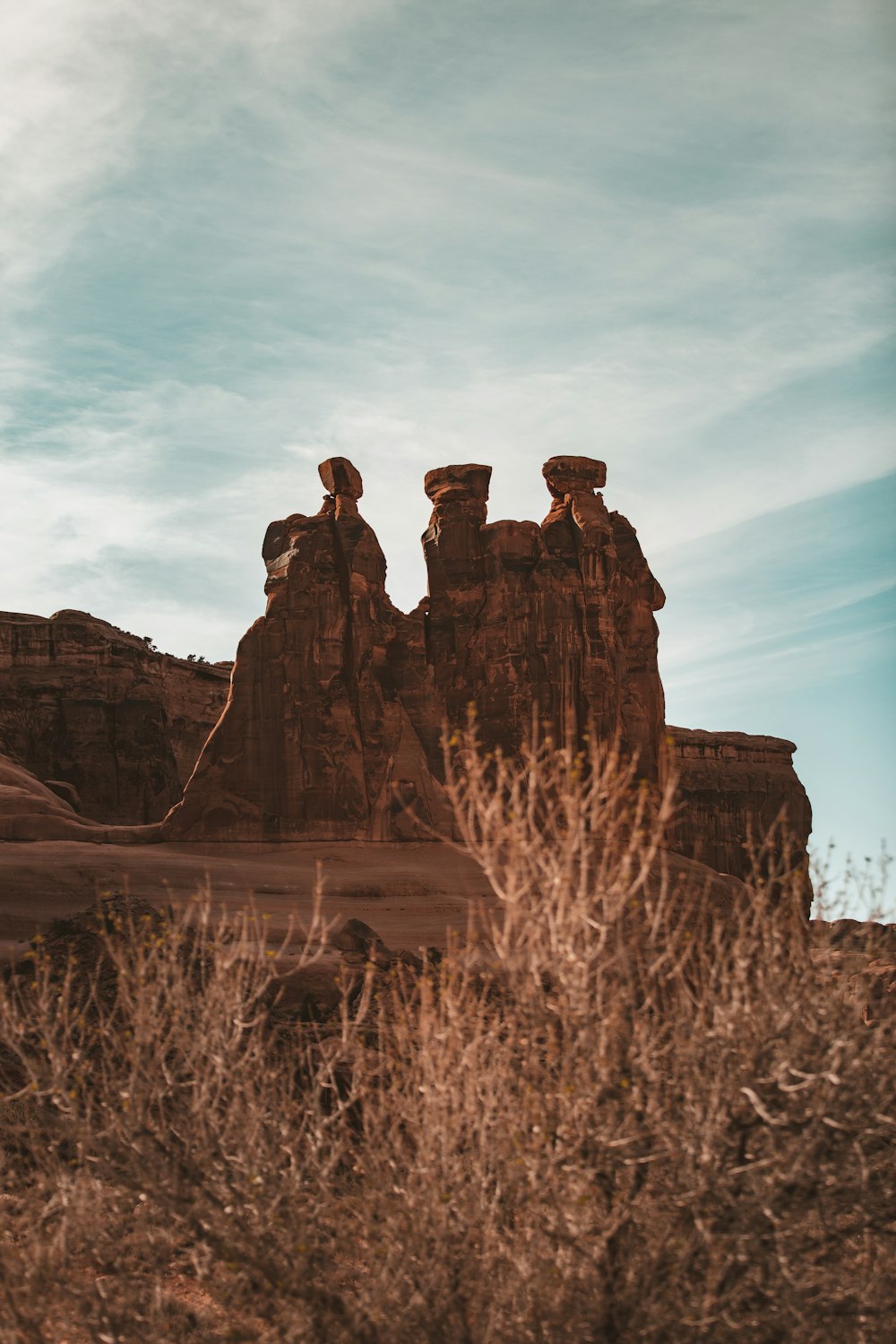 brown rock formation under blue sky during daytime