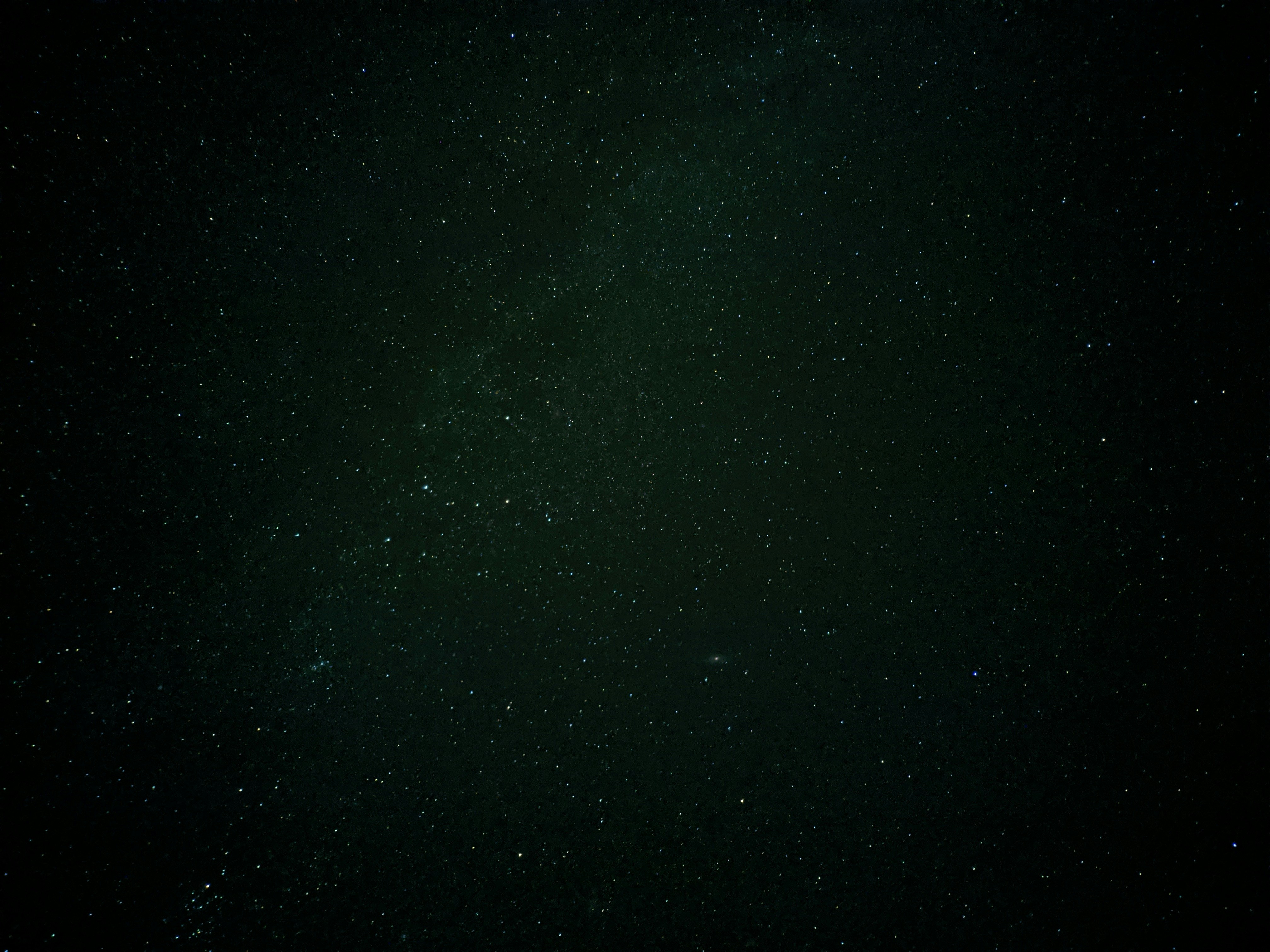 green and black starry night