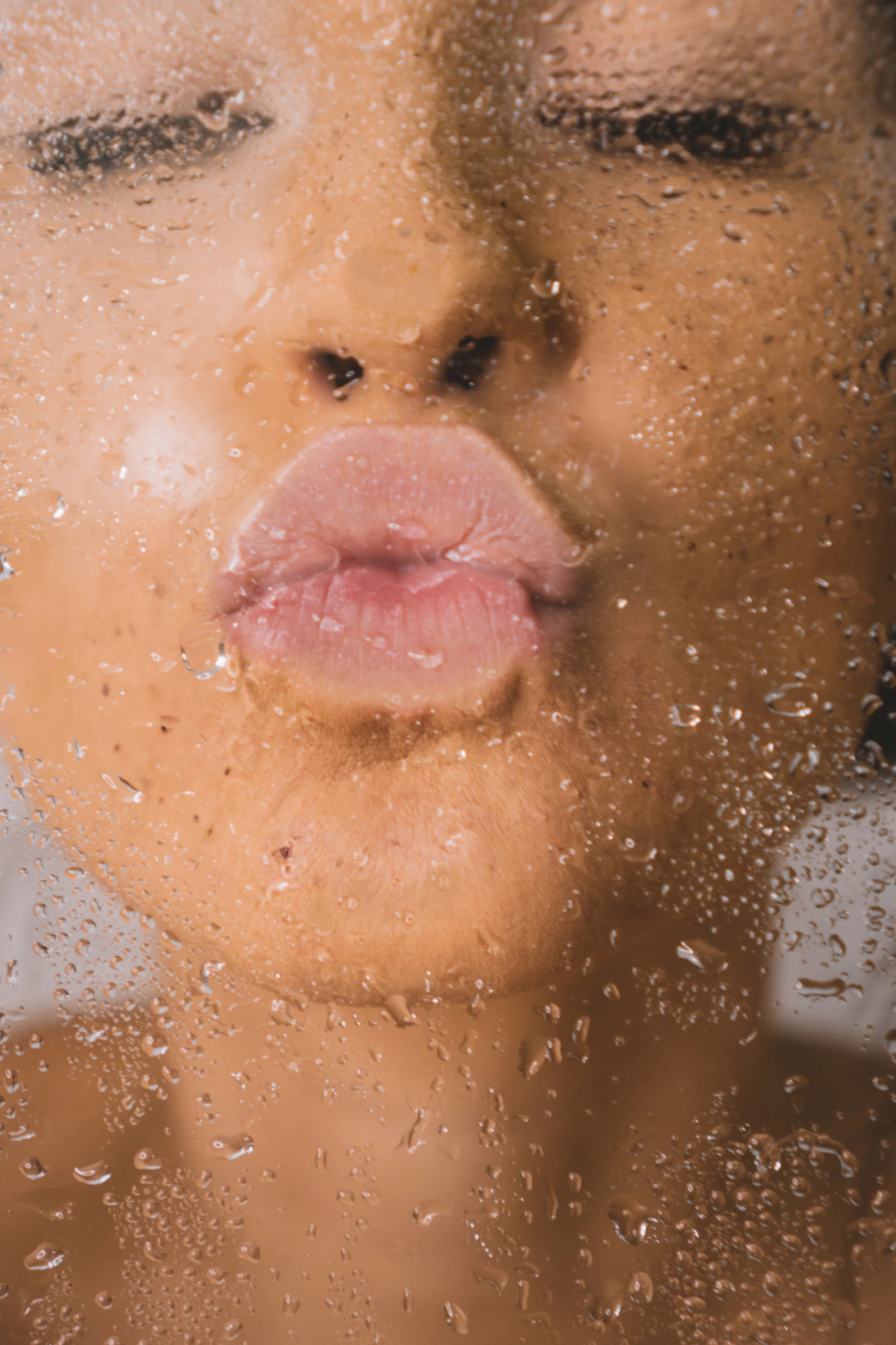 Water droplets on dewy, glowing skin, representing the hydration and glow effect from a Pre-Event Skin Preparation Facial