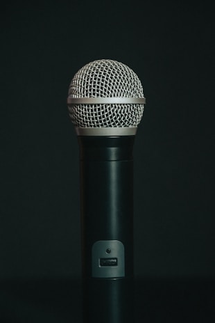 black microphone on black surface