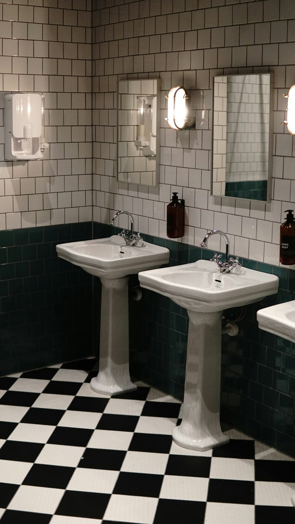 white ceramic sink with faucet