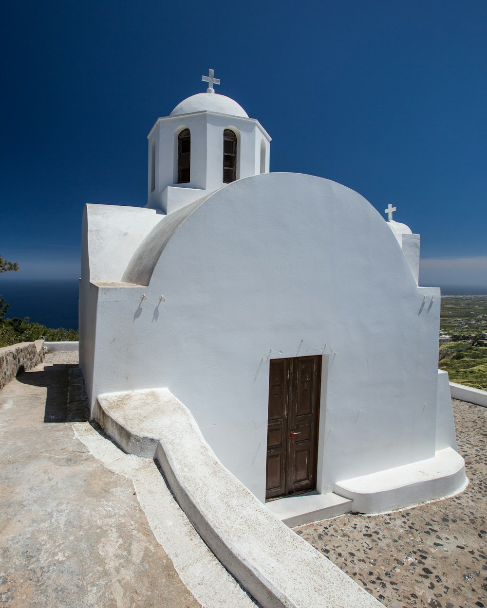 white concrete building under blue sky during daytime