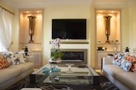 black flat screen tv on white wall
