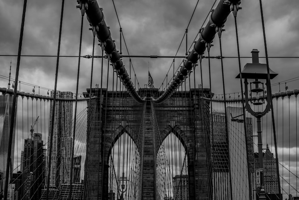 grayscale photo of brooklyn bridge