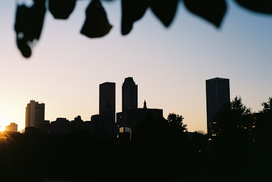 silhouette of city buildings during sunset in Centennial Park United States