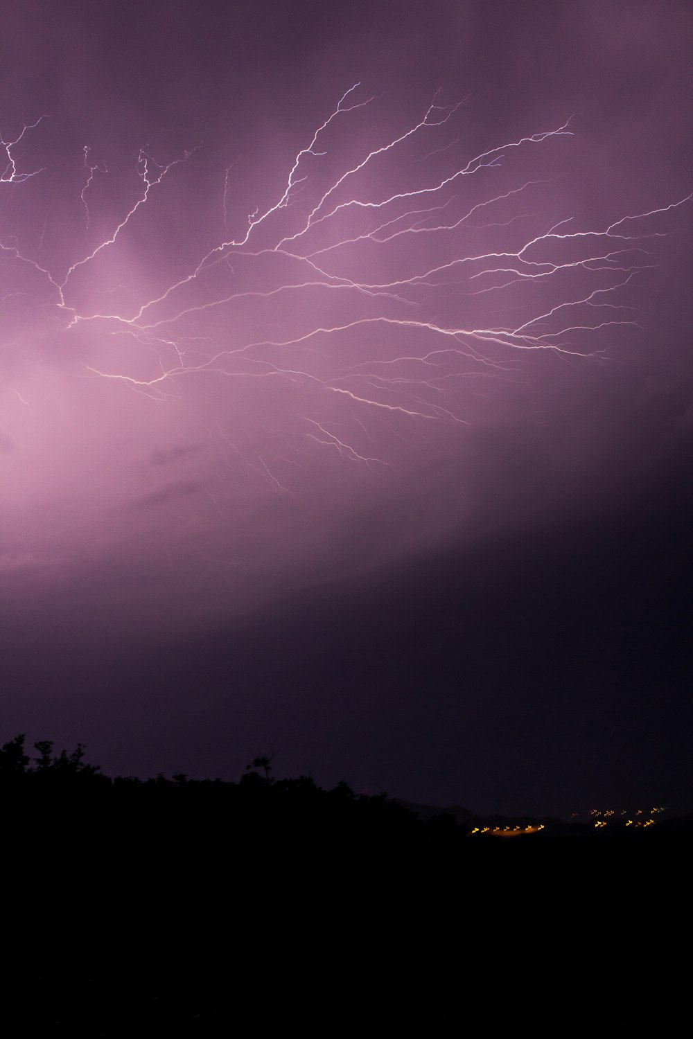 lightning UNK on black sky