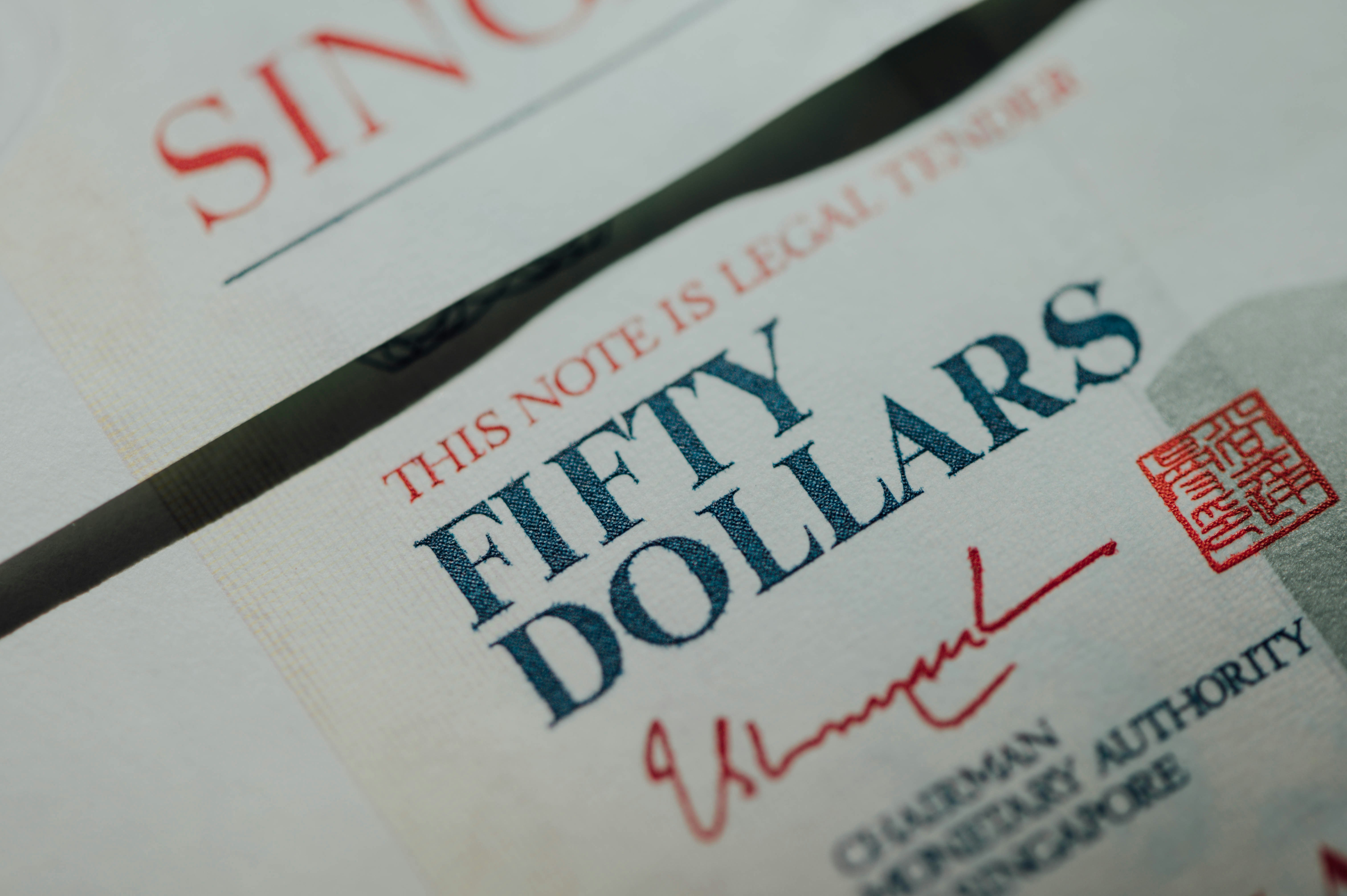 white printer paper with red and black text