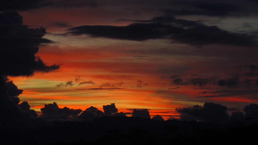 silhouette of mountain during sunset