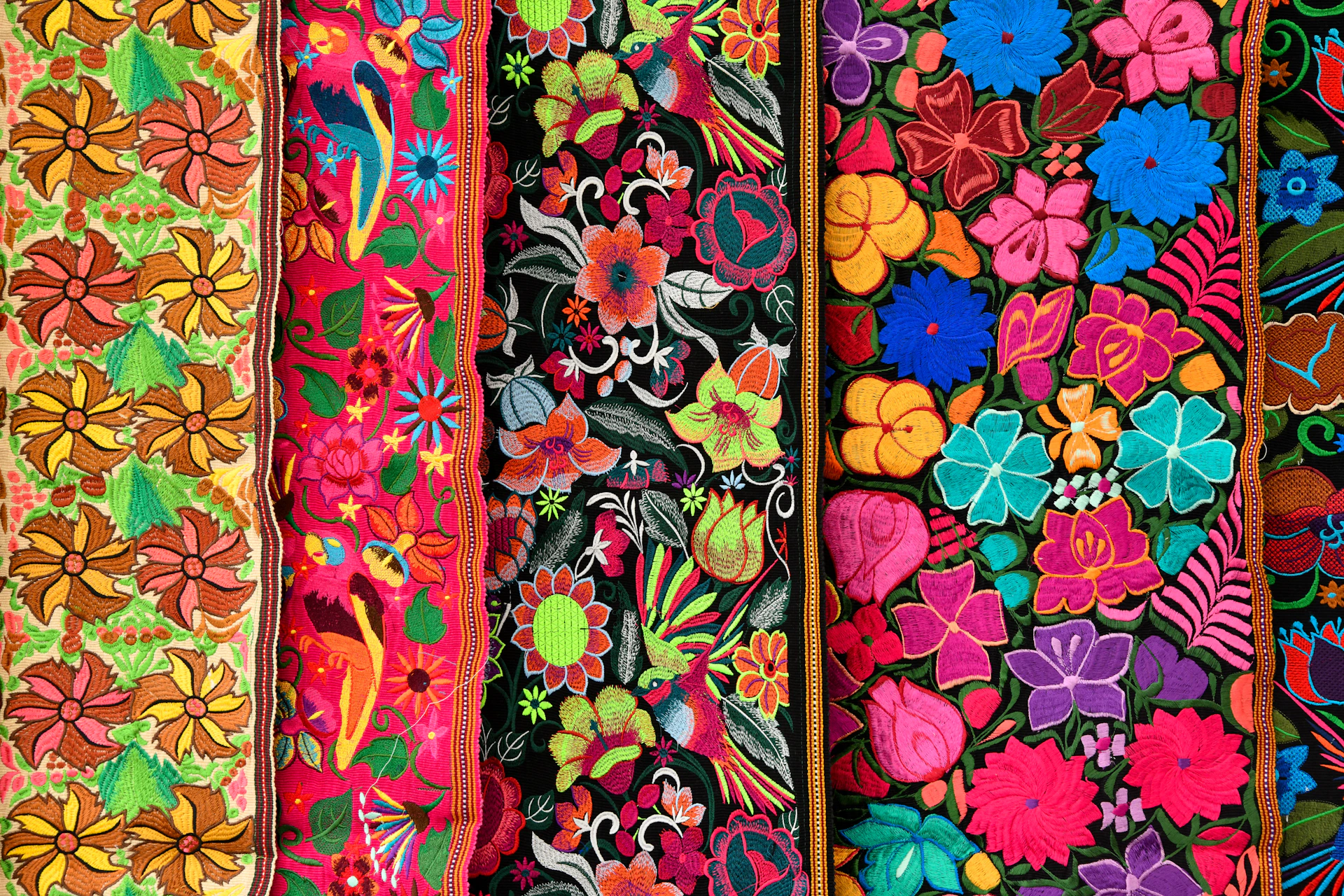 red green and yellow floral textile