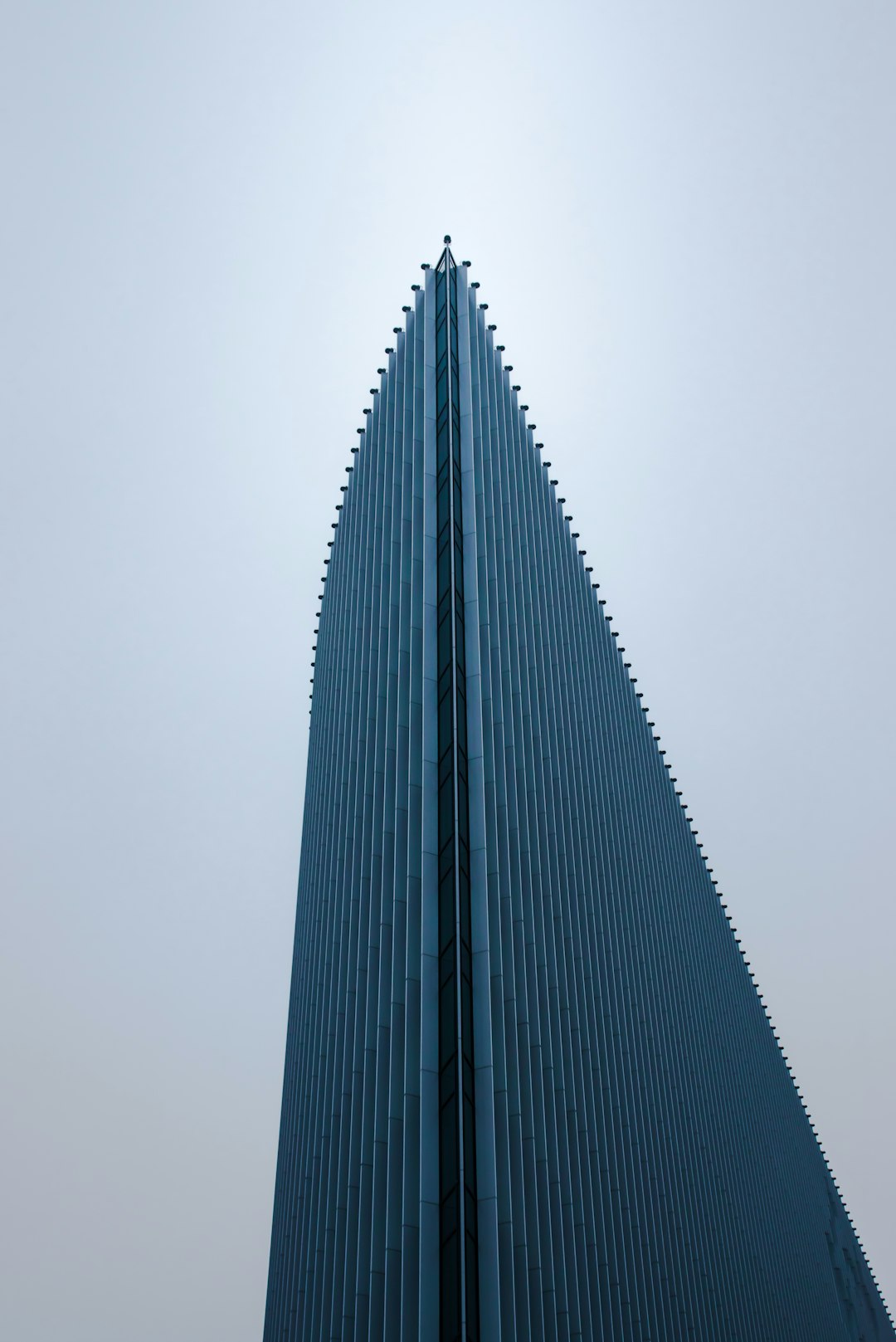 blue high rise building during daytime