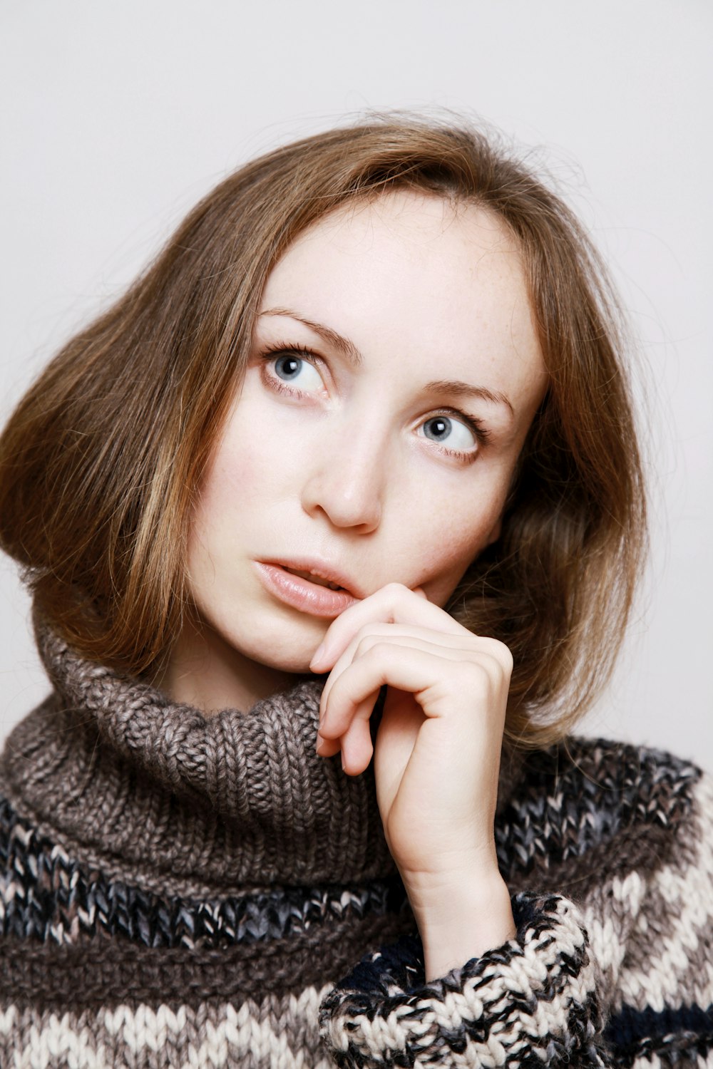 woman in black and white knit sweater