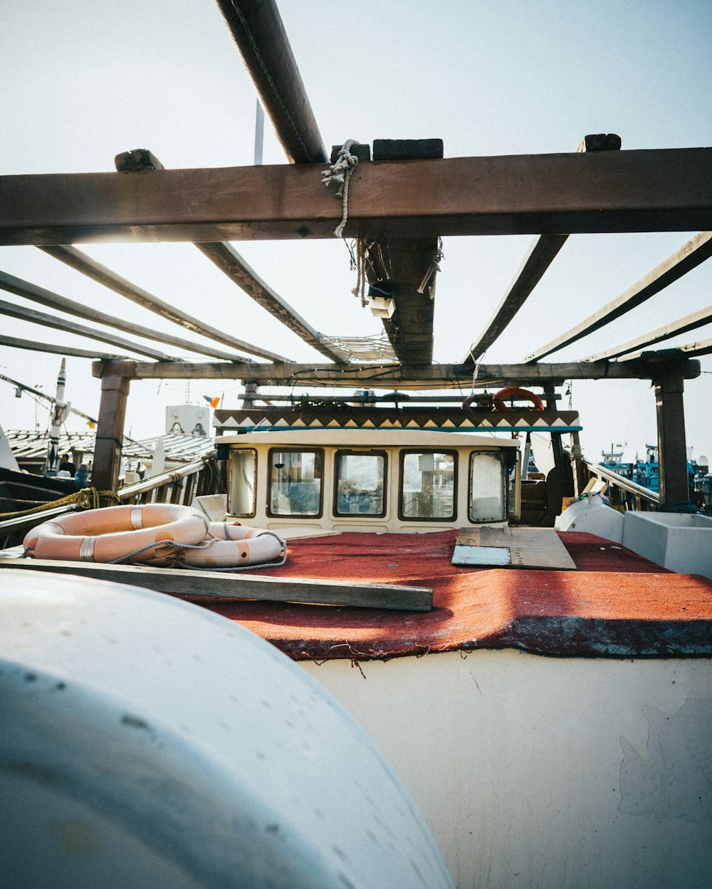 blue and brown boat on dock during daytime