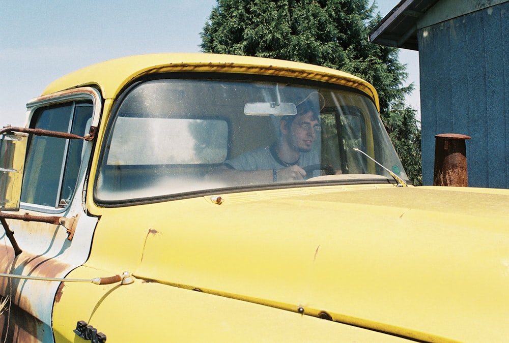 yellow and white vintage car