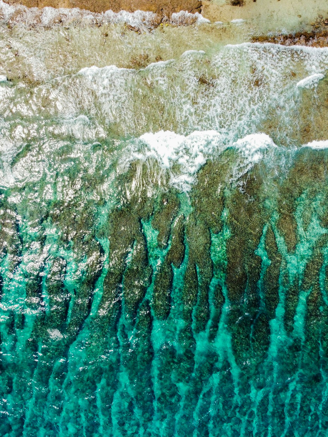 brown and gray stone with water