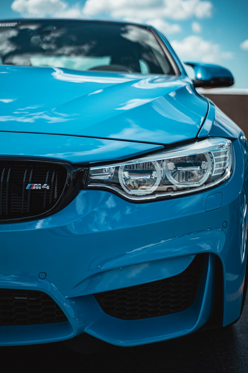 blue car with white and black license plate