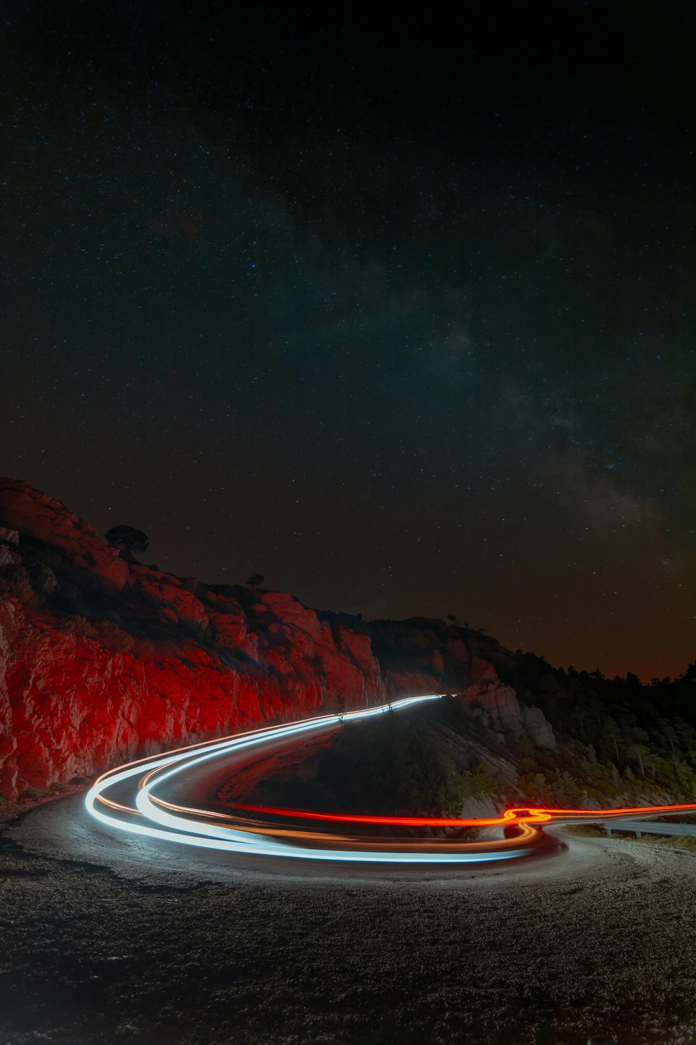 time lapse photography of cars on road during night time