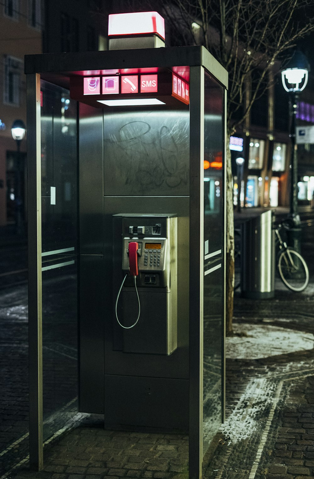 red and black telephone booth