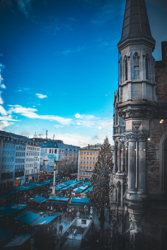 cars parked on side of road near buildings during daytime in München Germany