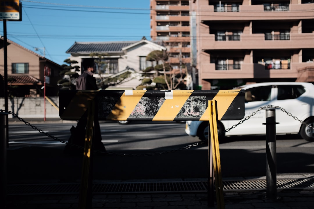 yellow and black car on road during daytime