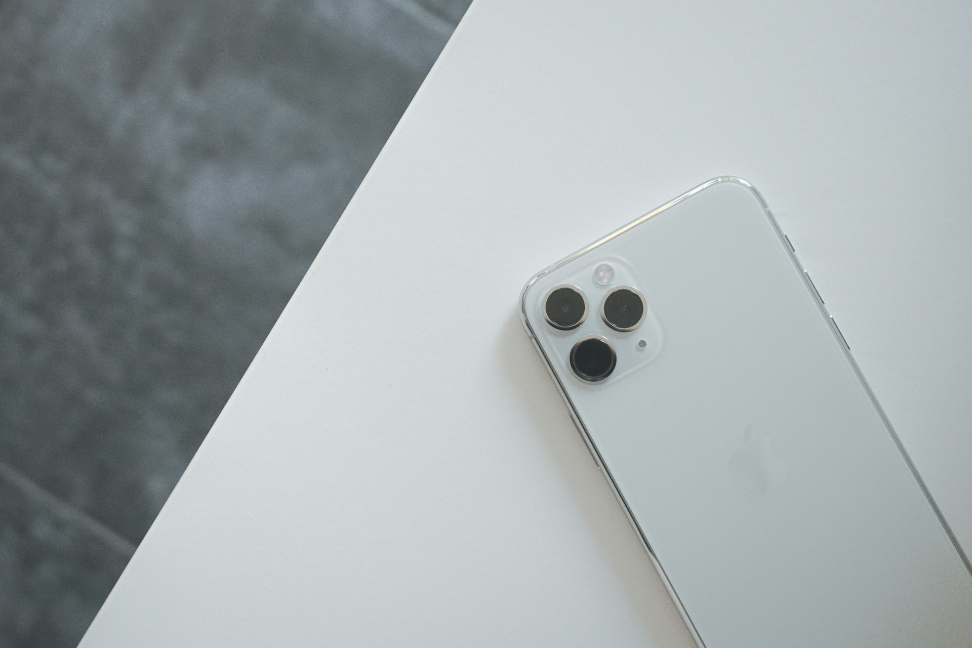 white remote control on white table