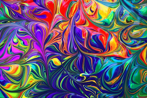 Abstract resin art in vibrant green purple and orange tones