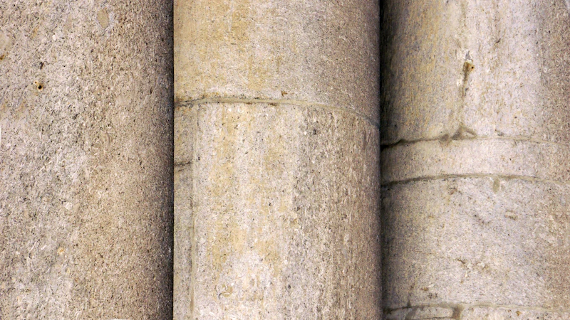 Warm stone columns in soft light