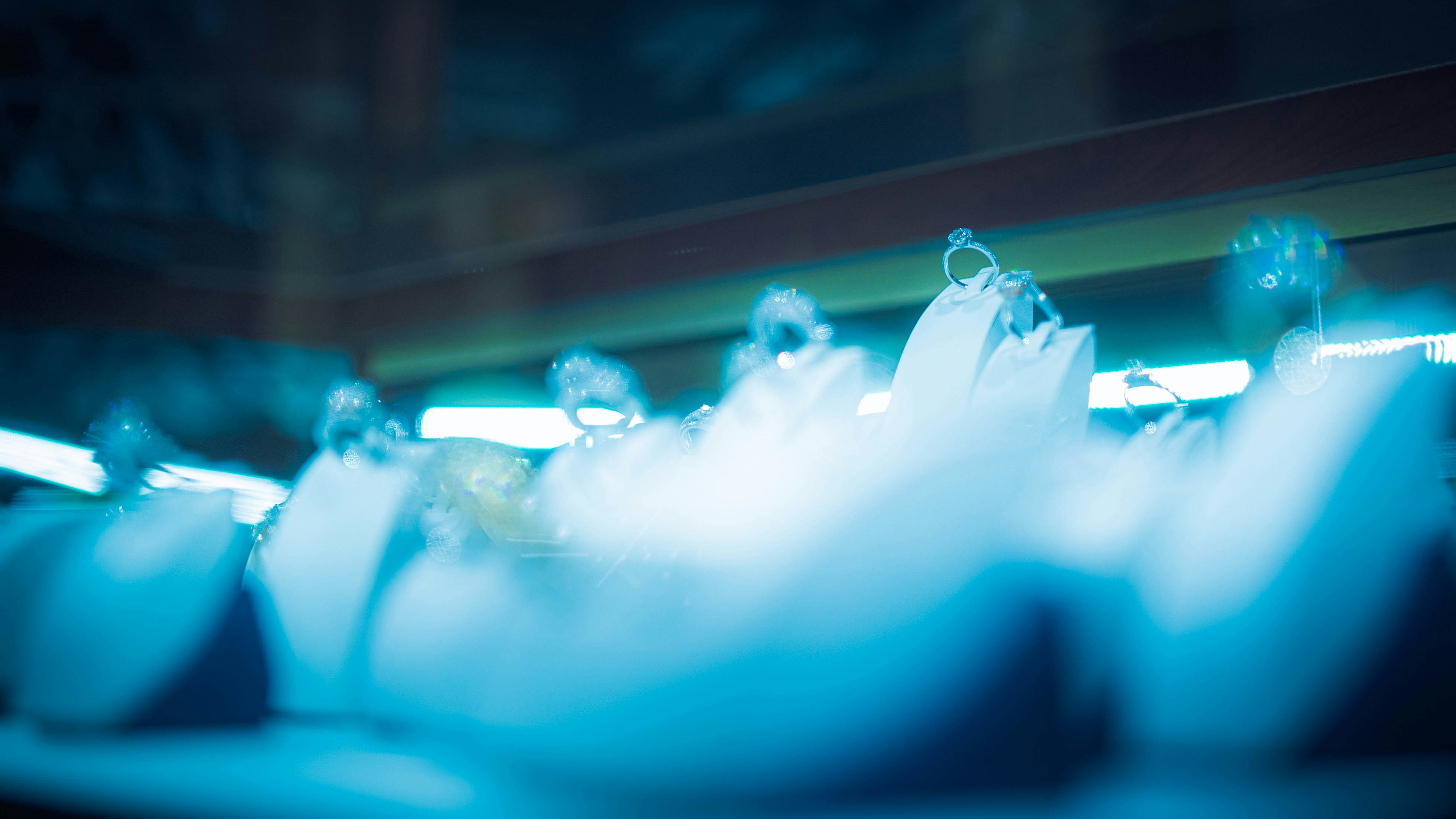 woman in white dress lying on floor