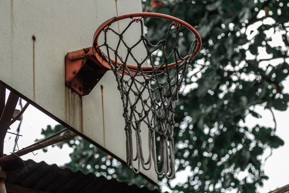 red basketball hoop with white net