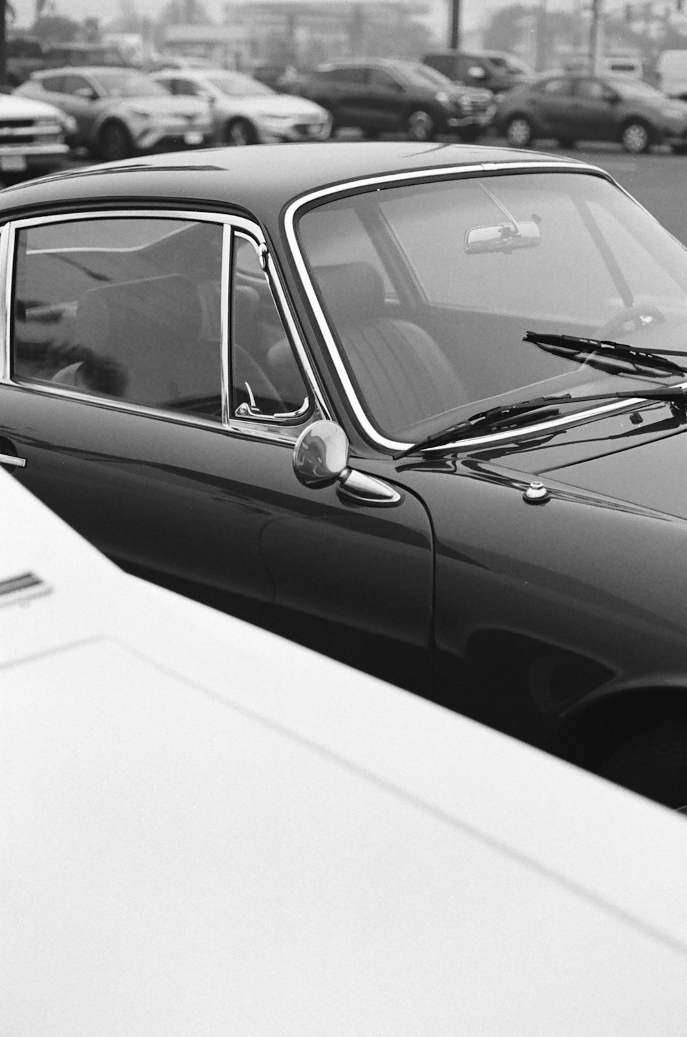 grayscale photo of classic car