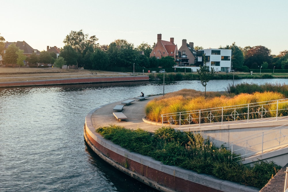 brown concrete bridge over river during daytime