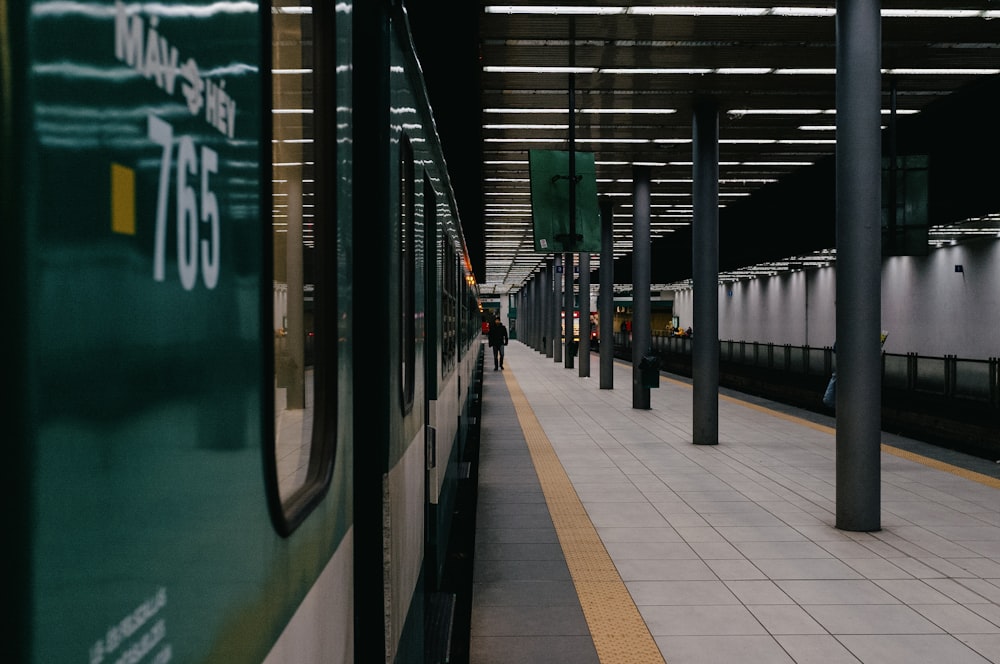 train station with green train