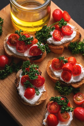 sliced tomato and green vegetable on brown bread
