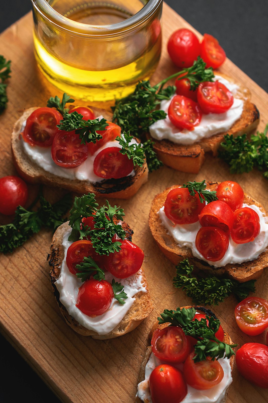 sliced tomato and green vegetable on brown bread