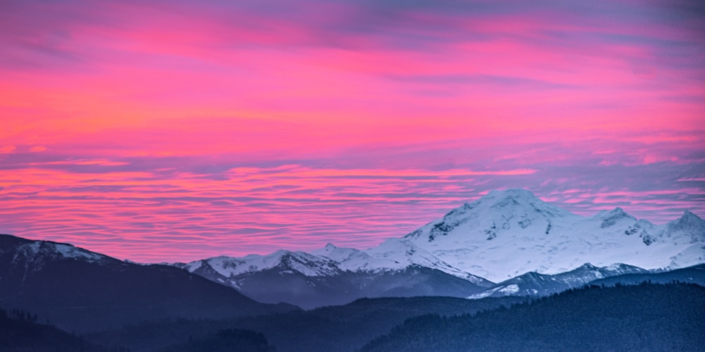 snow covered mountain during daytime