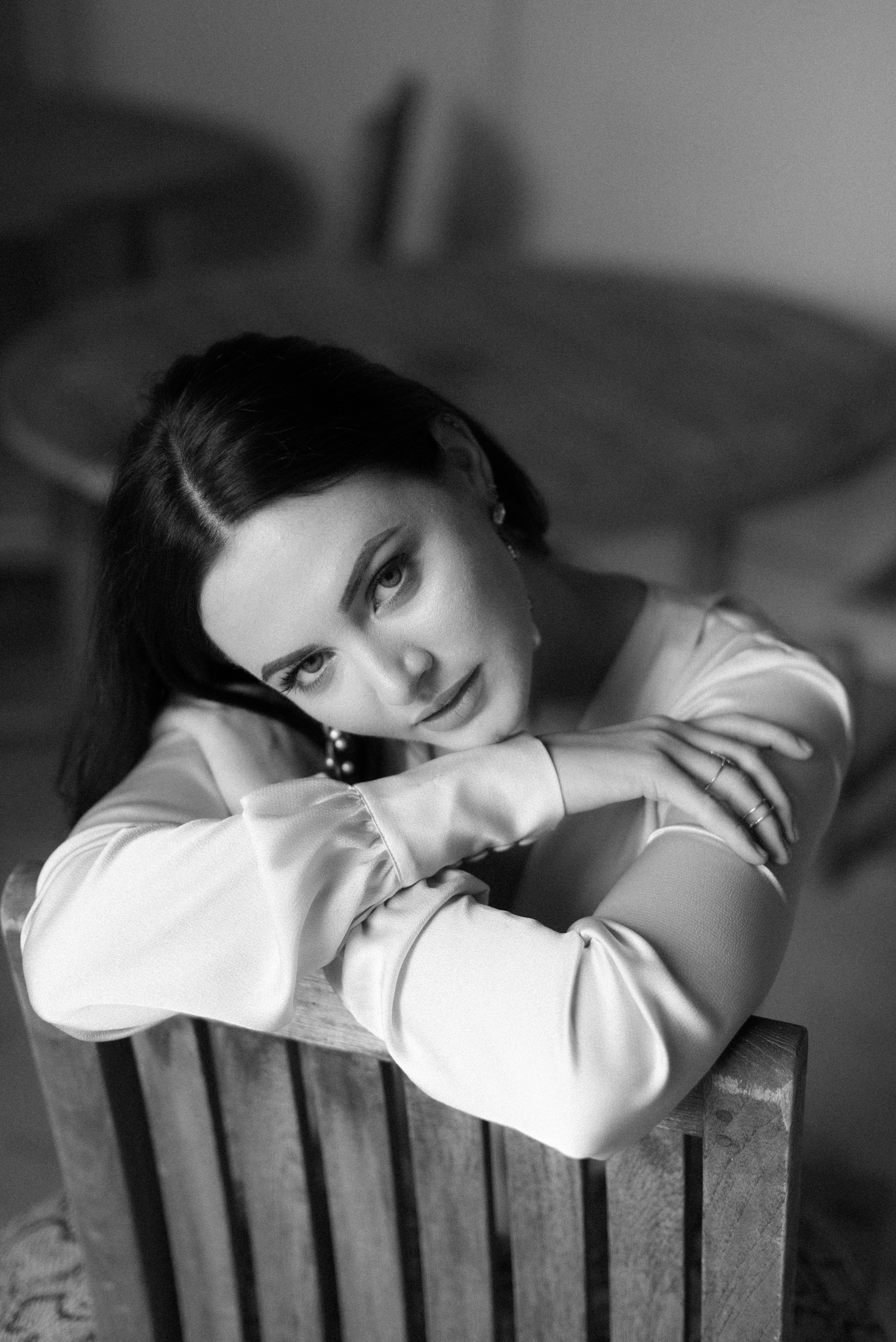 grayscale photo of girl in long sleeve shirt