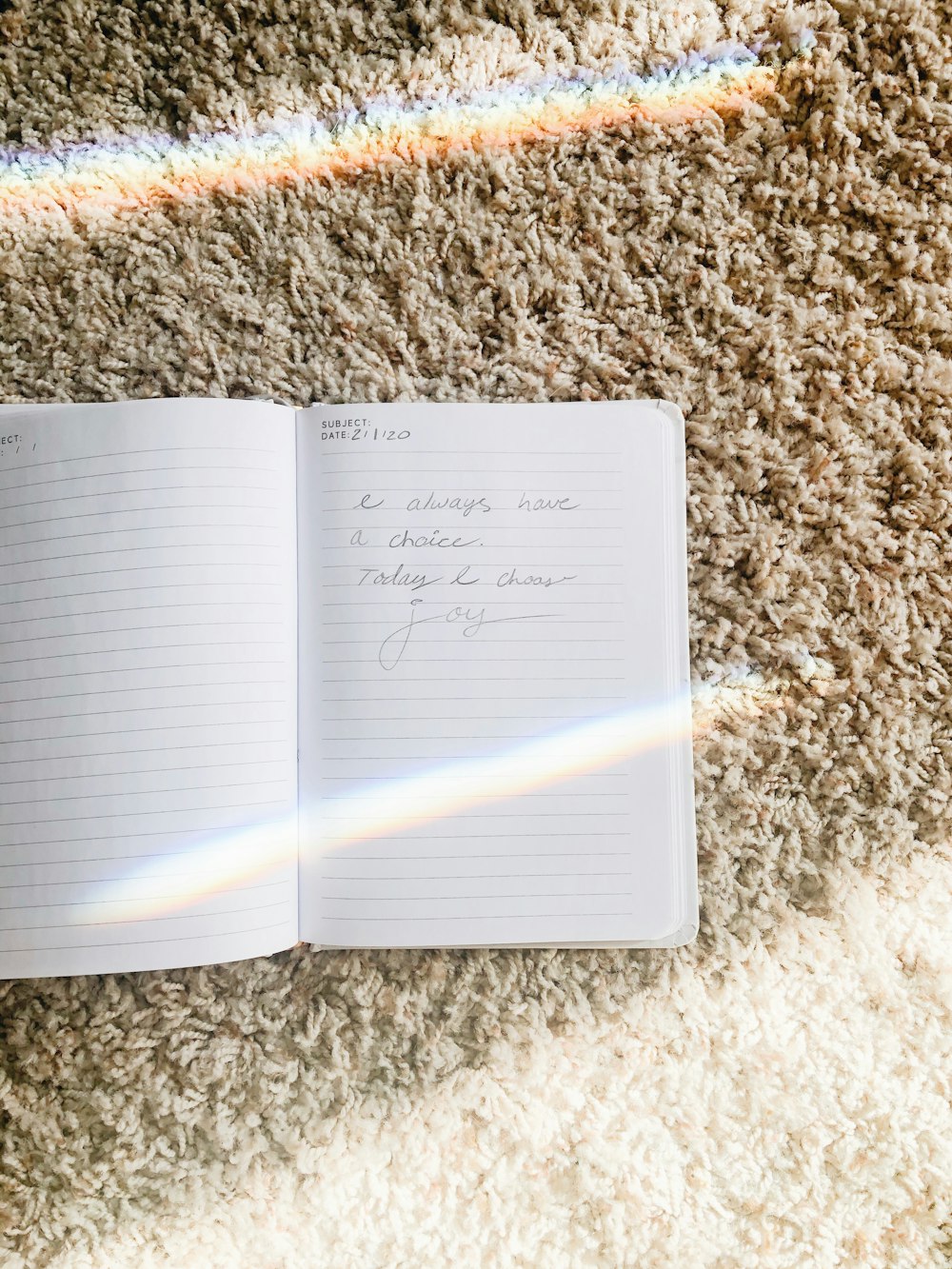 white book page on brown textile