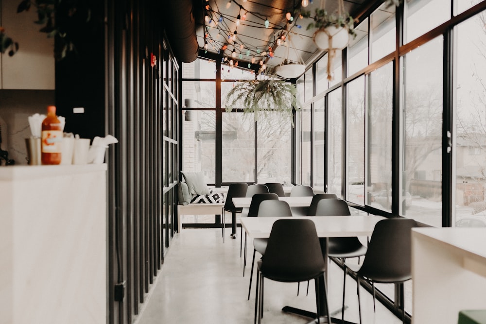 white and black chairs and table