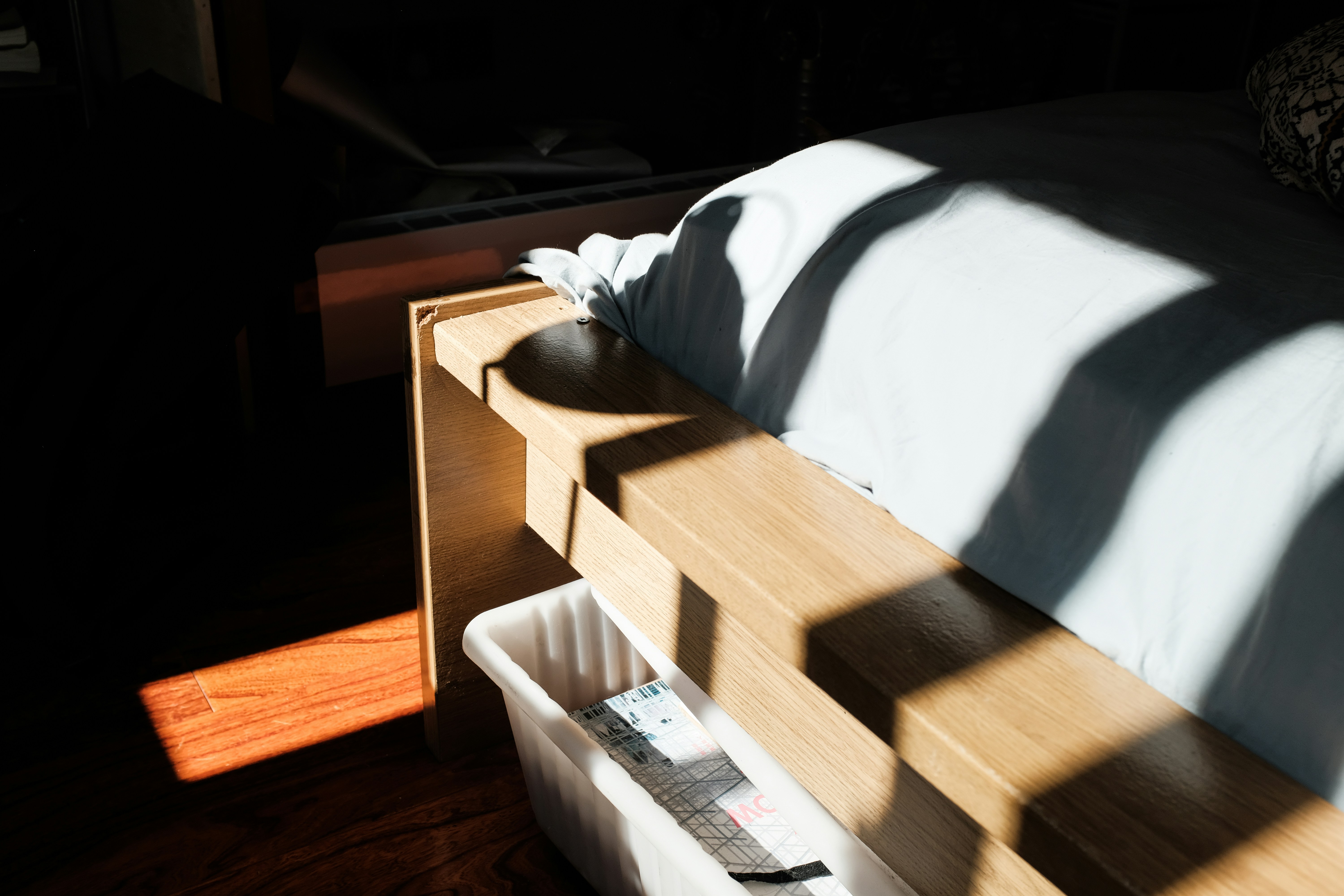 white textile on brown wooden table