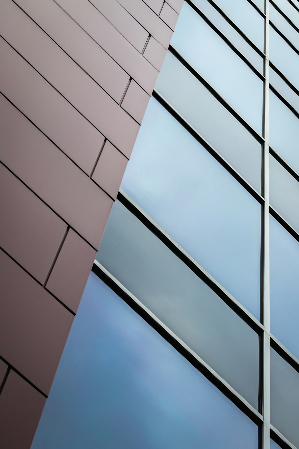 brown concrete building under blue sky during daytime