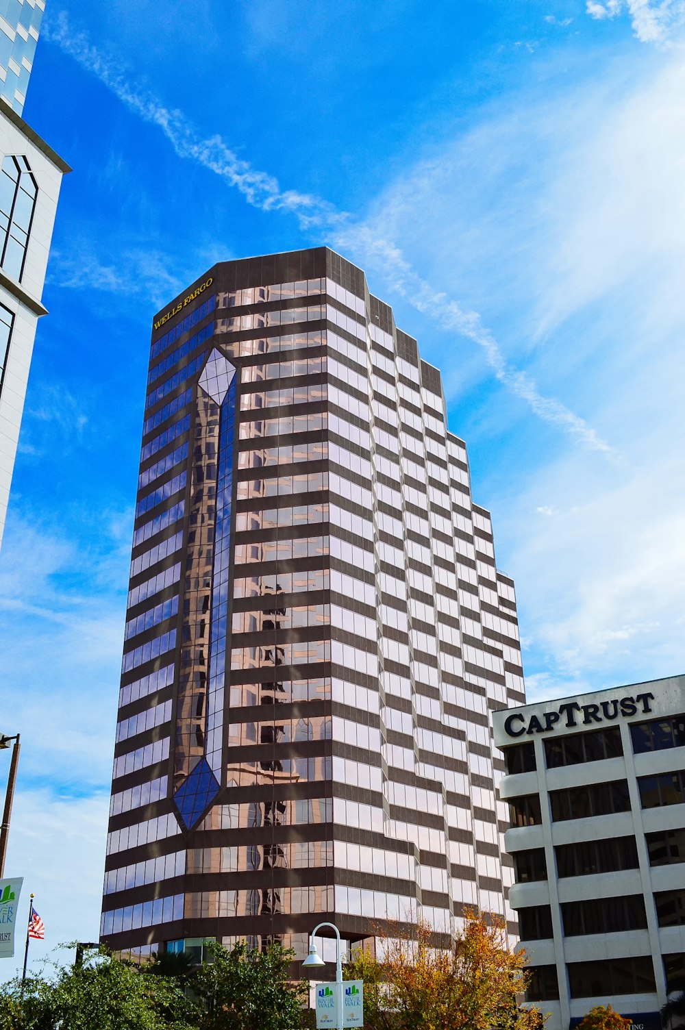 brown and white concrete building under blue sky during daytime