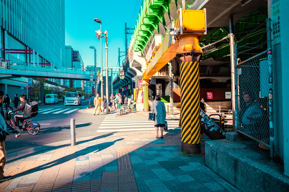 people walking on pedestrian lane during night time