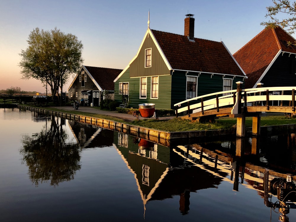 brown wooden dock on lake during daytime