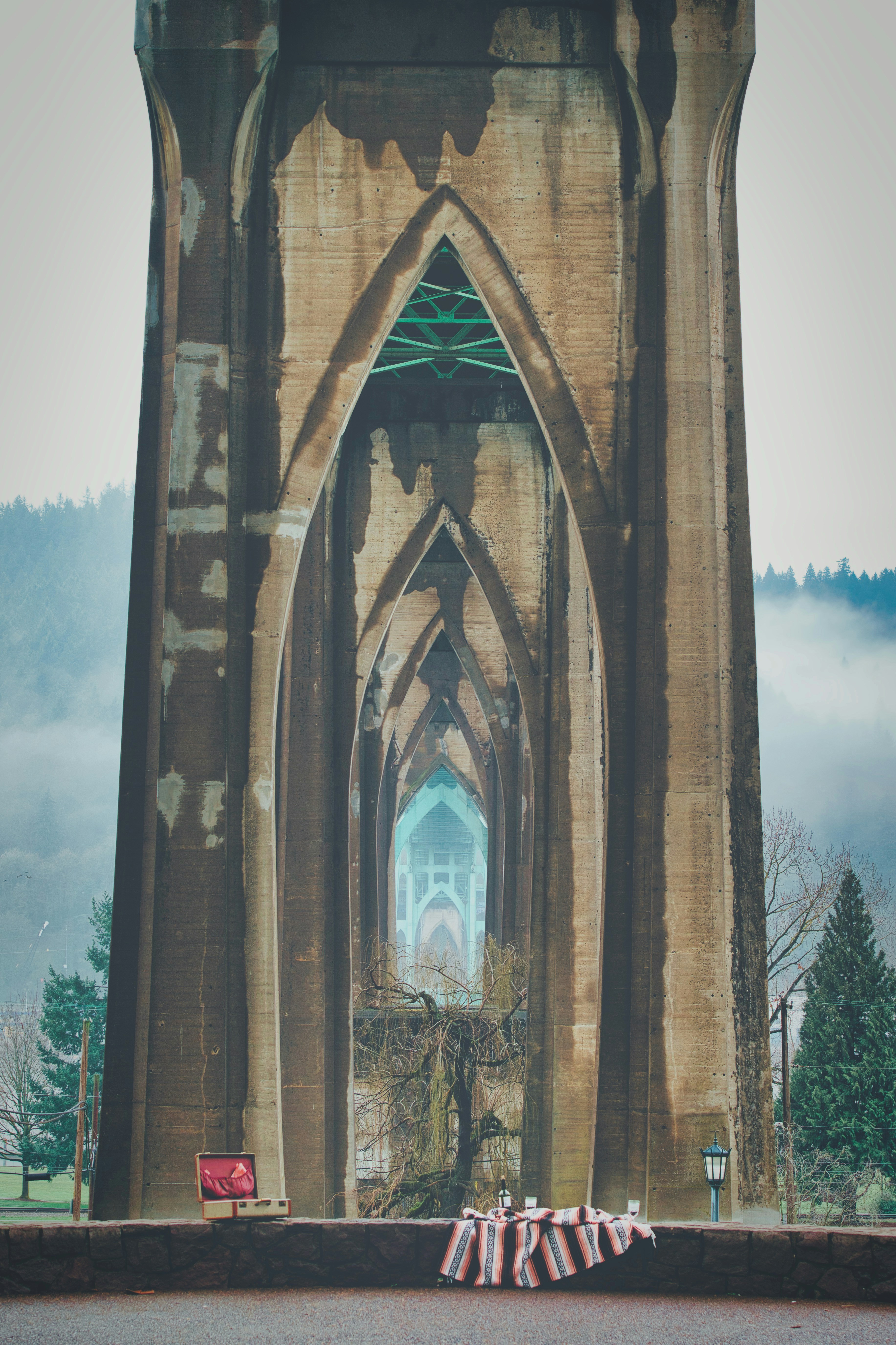 brown concrete arch under blue sky during daytime