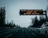 black and yellow road sign
