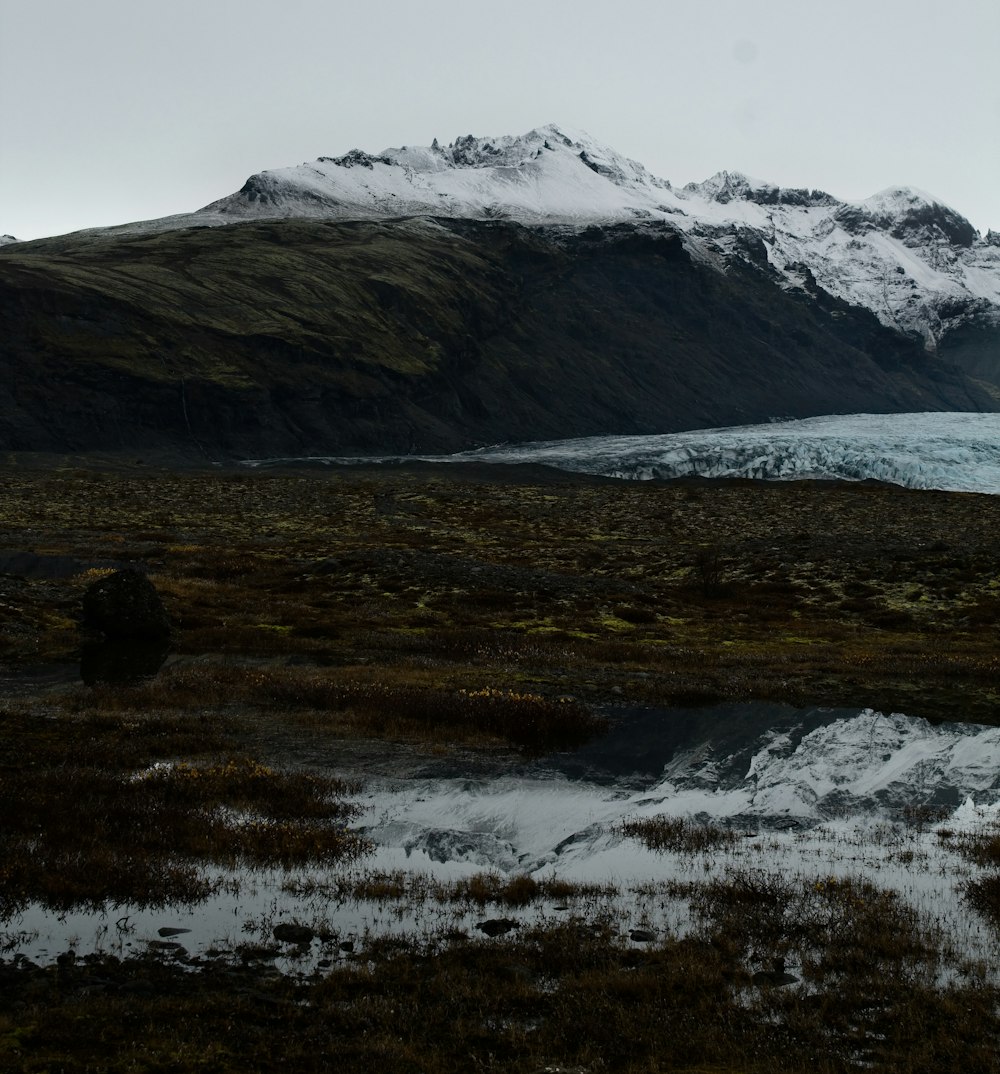 snow covered mountain during daytime