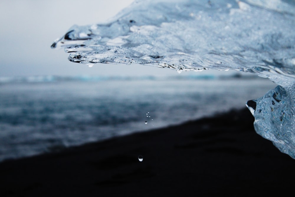 water splash on black sand