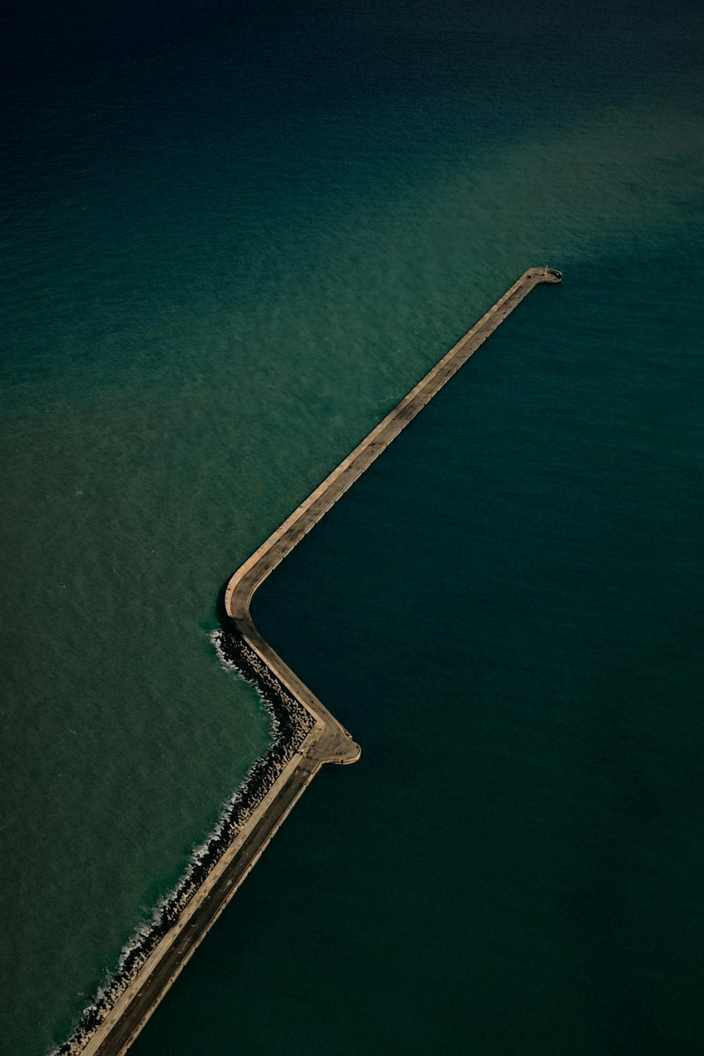 aerial view of dock on body of water during daytime